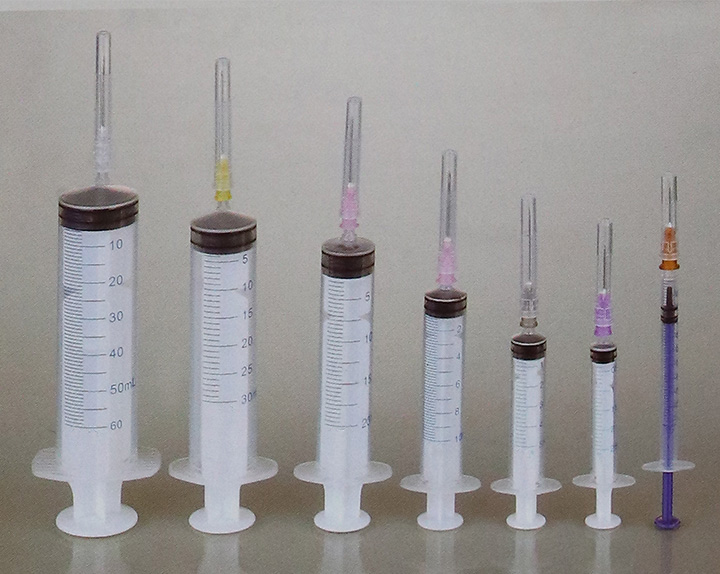 Disposable syringe with needle