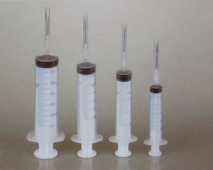 Disposable dosage syringe with needle